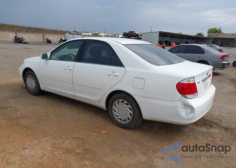 2006 Toyota Camry Le z USA, uszkodzony, nr VIN 4T1BE32K06U690310